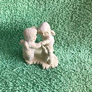 Snowbabies miniature “Playing games is Fun”